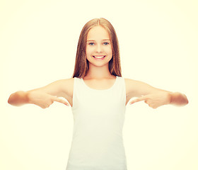 Image showing smiling teenage girl in blank white shirt