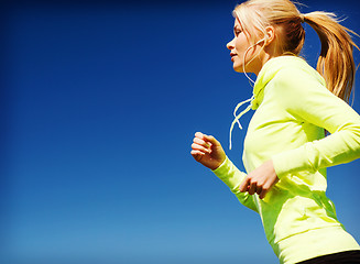 Image showing woman doing running outdoors