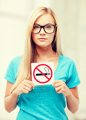 Image showing woman with smoking restriction sign