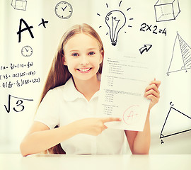 Image showing girl with test and A grade at school