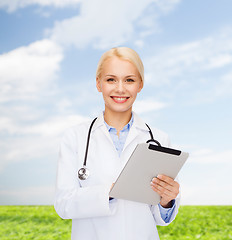 Image showing female doctor with stethoscope and tablet pc