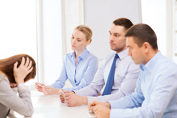 Image showing businesswoman getting fired in office