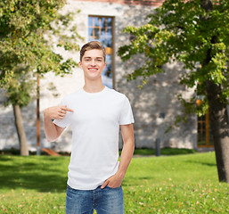 Image showing smiling young man in blank white t-shirt