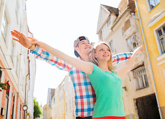 Image showing smiling couple in city