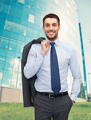 Image showing smiling young and handsome businessman