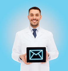 Image showing smiling male doctor with tablet pc