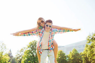 Image showing smiling couple having fun in park