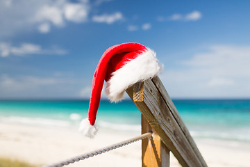 Image showing close up of santa helper hat on beach