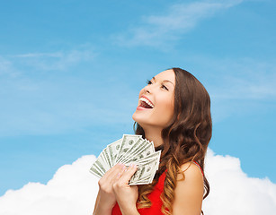 Image showing woman in red dress with us dollar money