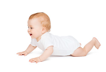 Image showing crawling curious baby looking up