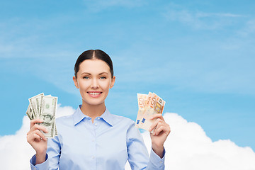 Image showing businesswoman with dollar cash money