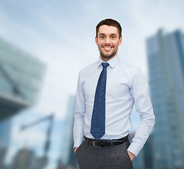 Image showing smiling young and handsome businessman