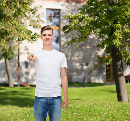 Image showing smiling young man in blank white t-shirt