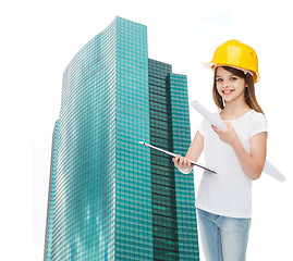 Image showing smiling little girl in protective helmet