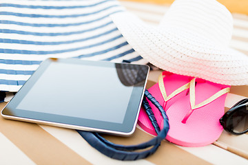 Image showing close up of tablet pc on beach