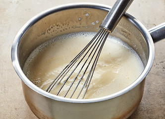 Image showing making vanilla sauce in a pot 