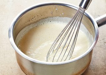 Image showing making vanilla sauce in a pot 