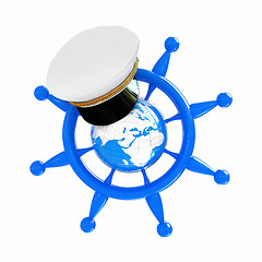 Image showing Steering wheel with Earth, and marine cap . Trip around the worl