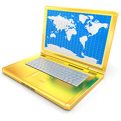 Image showing Gold laptop with world map on screen 