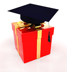 Image showing graduation hat on a red gift