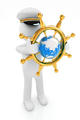 Image showing Sailor with gold steering wheel and earth. Trip around the world