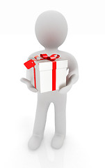Image showing 3d man and gift with red ribbon