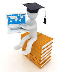 Image showing 3d man in graduation hat sitting on books and working at his lap