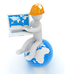 Image showing 3d man in a hard hat sitting on earth and working at his laptop 