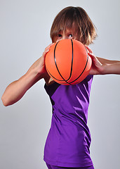 Image showing child exercising with ball