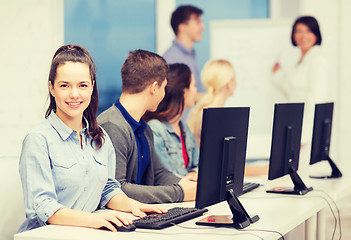 Image showing students with computer monitor at school