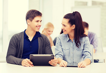 Image showing students looking at tablet pc in lecture at school