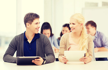 Image showing students looking at tablet pc in lecture at school