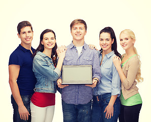 Image showing smiling students with laptop computer