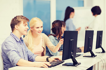 Image showing students with computer monitor at school