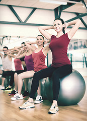 Image showing group of people working out in pilates class