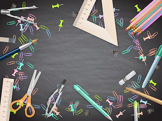 Image showing School supplies on blackboard background. EPS 10