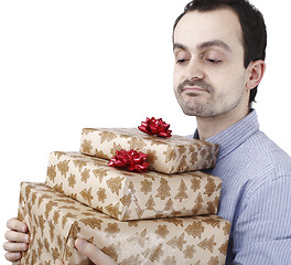 Image showing Young man holding a present