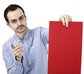 Image showing Man holding a paper