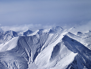 Image showing Snowy mountains in mist