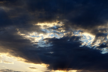 Image showing Sunset sky with sunbeams