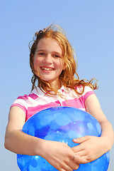 Image showing Young girl with beach ball