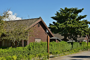 Image showing Wooden house and street 