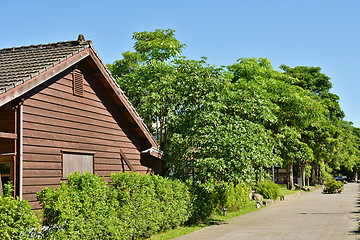 Image showing Wooden house and street 
