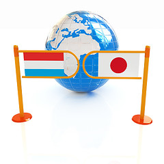 Image showing Three-dimensional image of the turnstile and flags of Japan and 