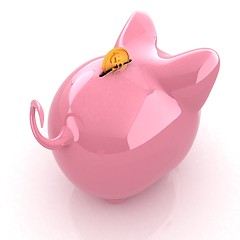 Image showing Piggy bank with gold coin on white