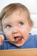 Image showing baby with a spoon