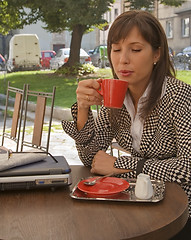 Image showing Enjoying coffee