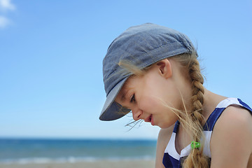 Image showing Portrait of beautiful little girl in denim hat