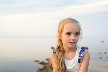Image showing Portrait of little girl on sunset