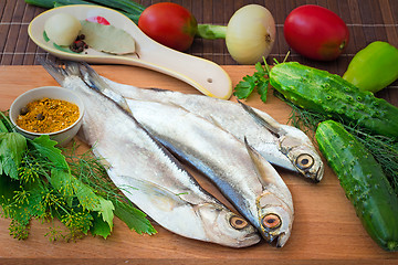 Image showing Fish and components for her preparation: vegetables, spices, par